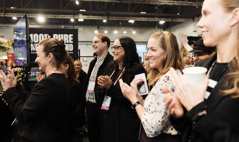 Exhibitors and buyers cheering during the Meeting Newz Best Stand Awards announcement at MEETINGS 2025, New Zealand's premier tradeshow for the Meetings, Incentives, Conferences, Exhibitions, MICE, Business Events industry